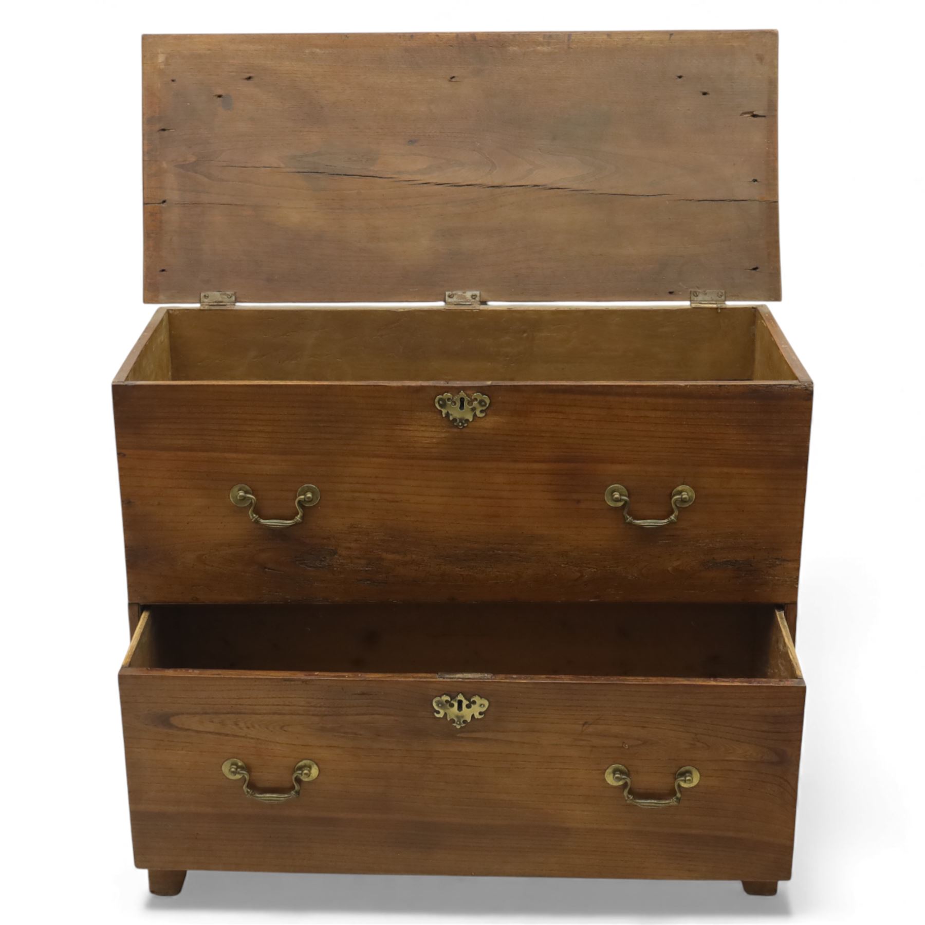 18th century style oak mule chest, the hinged rectangular top opening to a plain interior, above a lower section fitted with two long drawers with brass swan neck handles and shaped escutcheons, upon shaped bracket feet