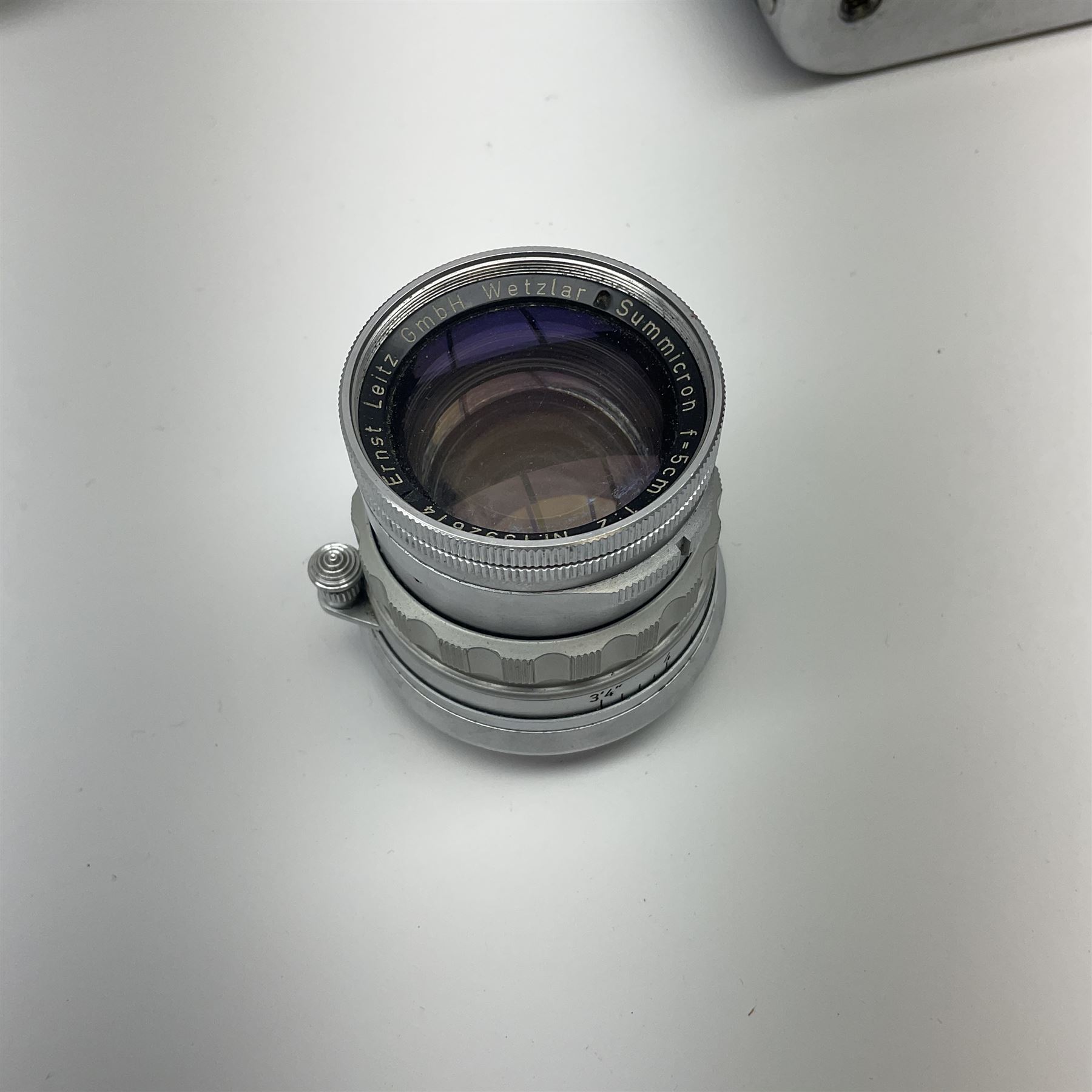 Leica M3 camera body, 1959, chrome finish, serial number '986937', fitted with 'Ernst Leitz GmbH Wetzlar Summicron f=5cm 1:2 Nr.1592614' lens, with Leica M3 instruction booklet