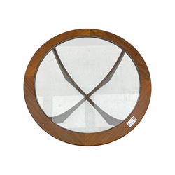 G Plan - Mid-century teak coffee table, circular form with inset glass top within a wide chamfered teak border, on sculptural cruciform base with curved intersecting supports