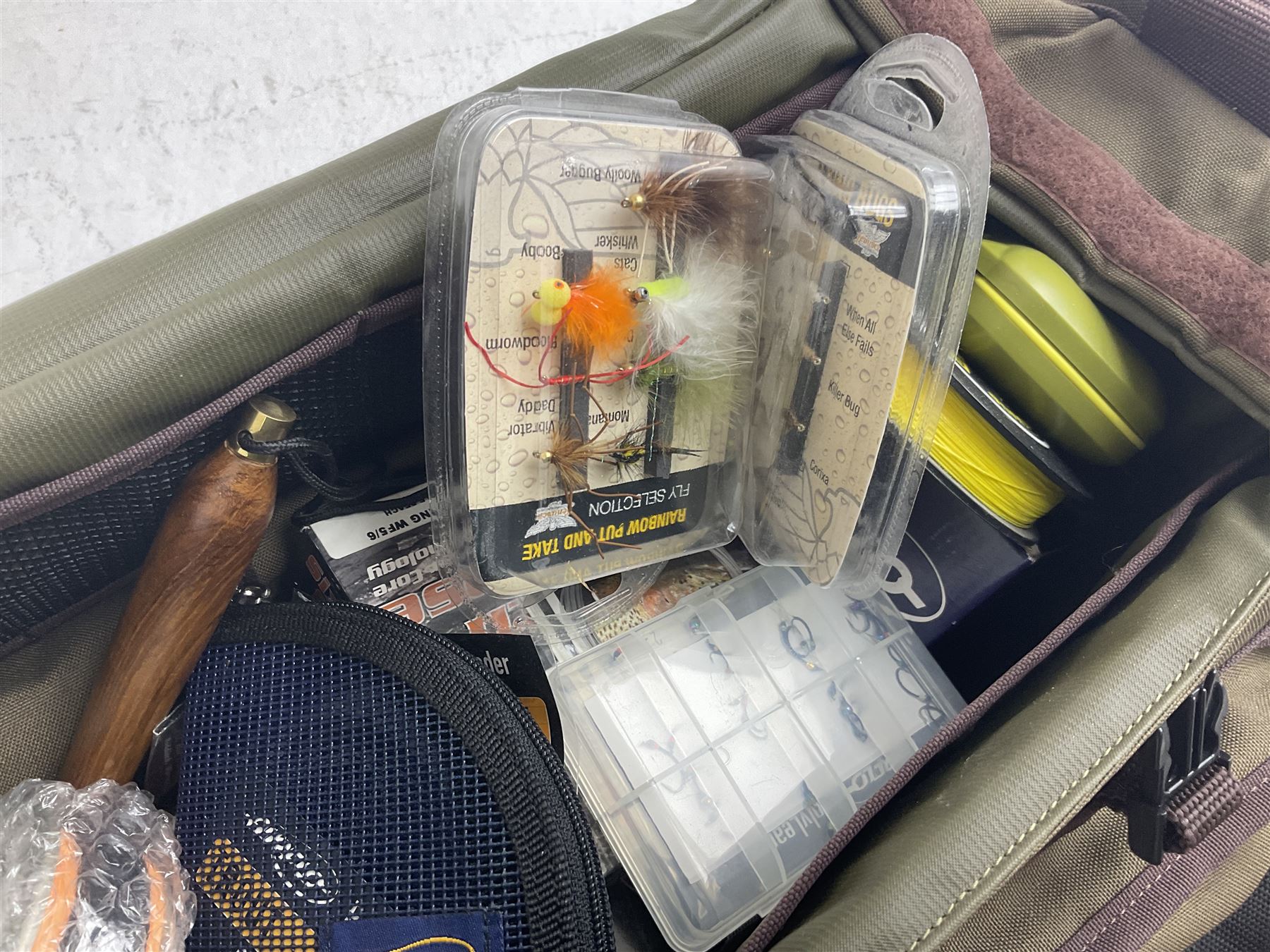 Five fly fishing rods, to include Greys Greyflex M2, Greys Missionary 9'3 etc, together with fly reel, flies, Wychwood fishing bag and various fishing other tackle items 