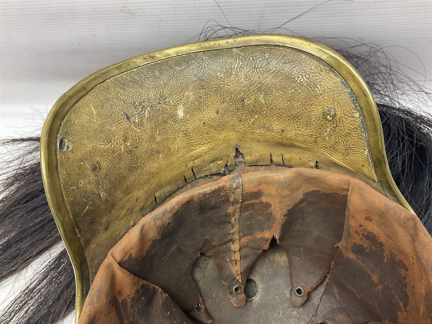 French 1874 Pattern Dragoon trooper's helmet with original liner and extra long criniere; stamped 10 DR with other numbers and Alexis Godilllo to the back of the helmet