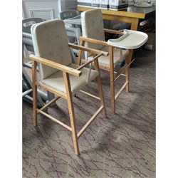 Set of three plastic and a pair of wooden baby high chairs with additional saddle stools (9)- LOT SUBJECT TO VAT ON THE HAMMER PRICE - To be collected by appointment from The Ambassador Hotel, 36-38 Esplanade, Scarborough YO11 2AY. ALL GOODS MUST BE REMOVED BY WEDNESDAY 15TH JUNE.