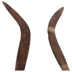 Two wooden aboriginal boomerangs, largest L60cm