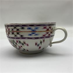 19th century Nymphenburg teacup and saucer, decorated in polychrome lattice type design, with impressed marks beneath, together with a 19th century Continental tea cup and saucer, decorated in the style of Meissen with hand painted panels of Italianate landscapes, and a Continental bowl with gilt metal mount to rim, with blue crossed swords mark beneath