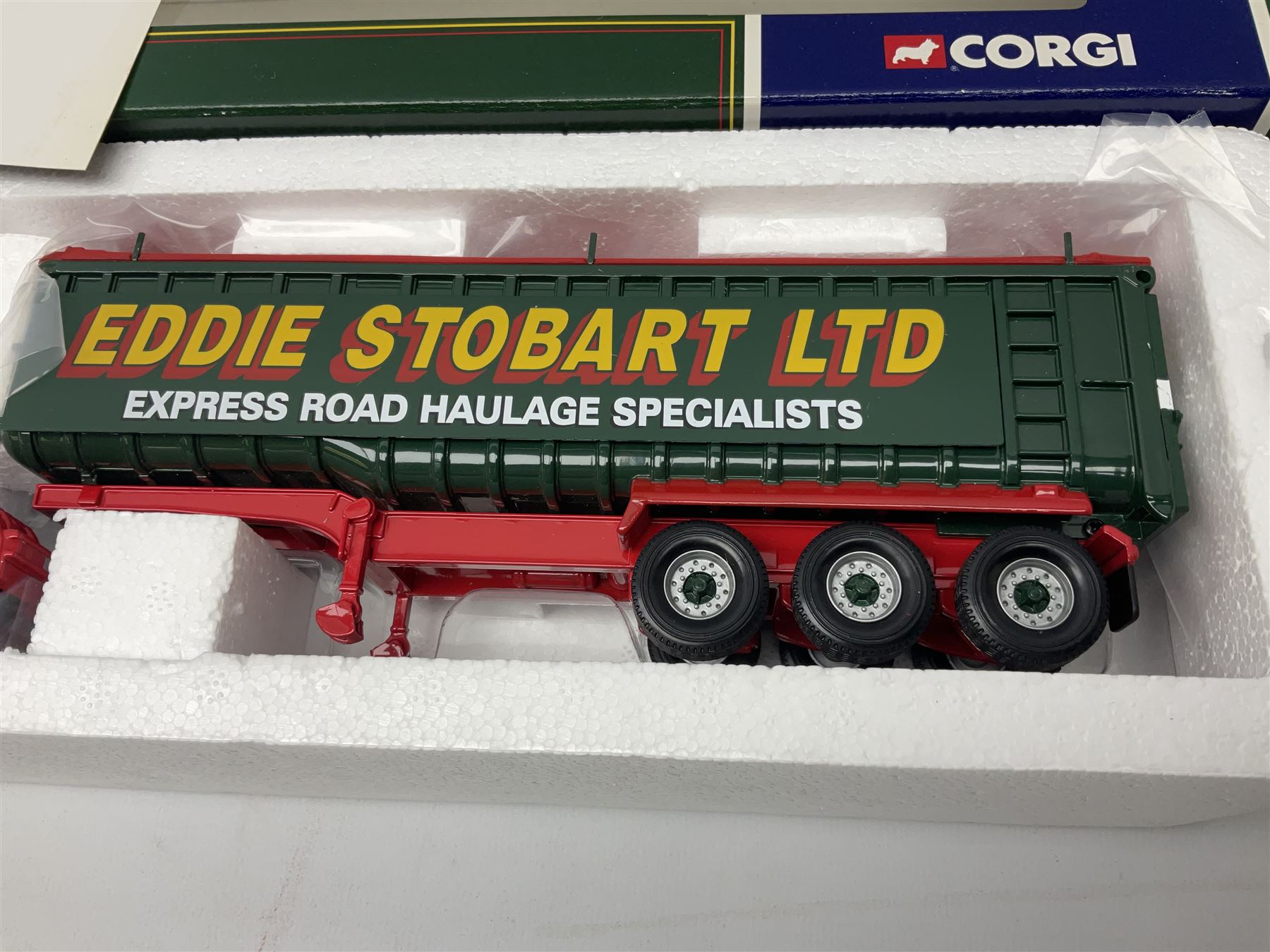 Corgi Eddie Stobart - three lorries; limited edition CC12802 Scania T-Cab Bulk Tipper; limited edition CC13201 DAF XF Super Space Cab Curtainside; and CC13401 MAN TGA Curtainside; all boxed (3)