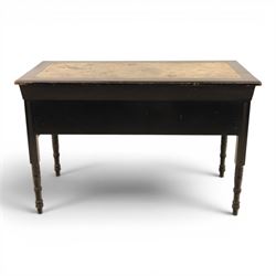 Victorian Aesthetic Movement ebonised writing desk, rectangular top with inset tooled leather, central frieze drawer with pierced spandrels, flanked by two banks of three drawers, brass swing handles, raised on turned supports 
