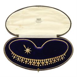 Edwardian 15ct gold split pearl fringe necklace, thirteen graduating cross pendants, each spaced by pearl drops, the centre cross suspending an 18ct gold pearl star pendant, to a pearl set chain necklace, in silk and velvet lined case by Elkington, Glasgow