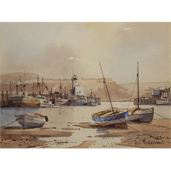 Don Micklethwaite (British 1936-): Scarborough Harbour at Low Tide with Cobles, watercolour signed 22cm x 30cm