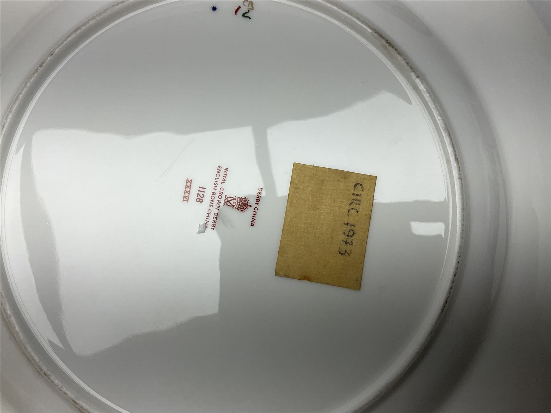 Seven plates including Royal Crown Derby Imari examples, early Worcester Flight & Barr