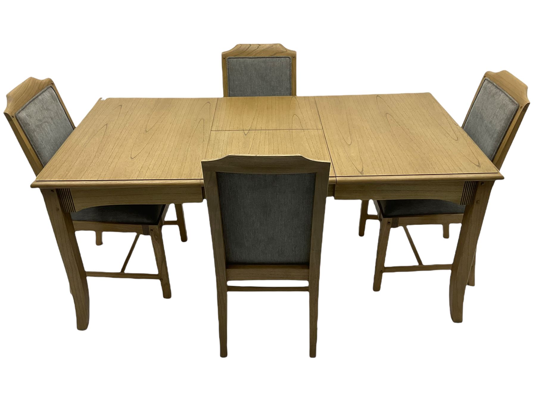 Windsor by Mark Devany oak rectangular extending dining table, with butterfly leaf, and four chairs with upholstered seats and backs