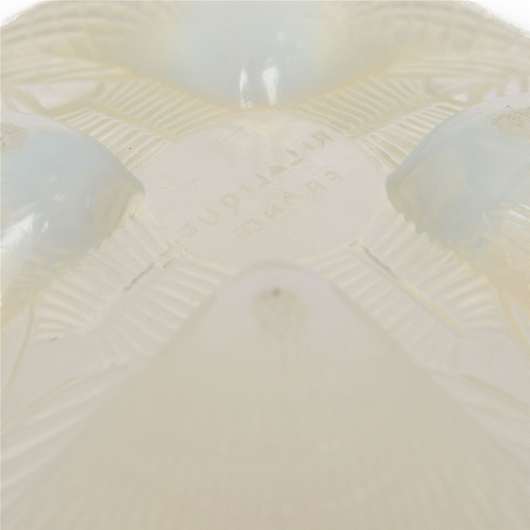 Lalique Coquilles opalescent glass bowl in the form of three shells, signed 'R Lalique beneath, D18cm