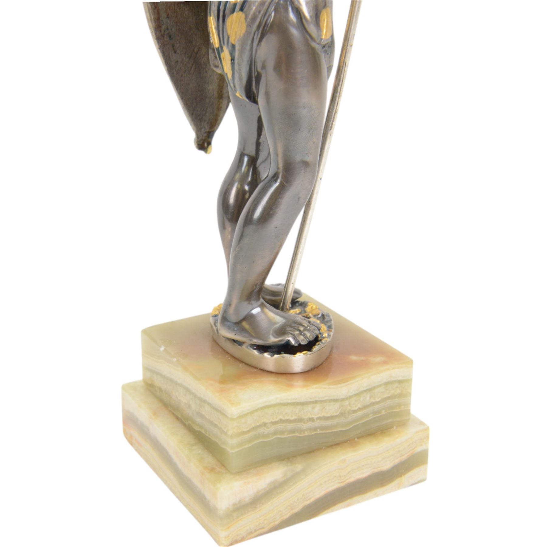 Italian limited edition silvered and gilt bronze figure of a Zulu warrior, with spear and shield, signed Giuseppe Vasari, no. 45/400,  upon an green stepped onyx base H25cm