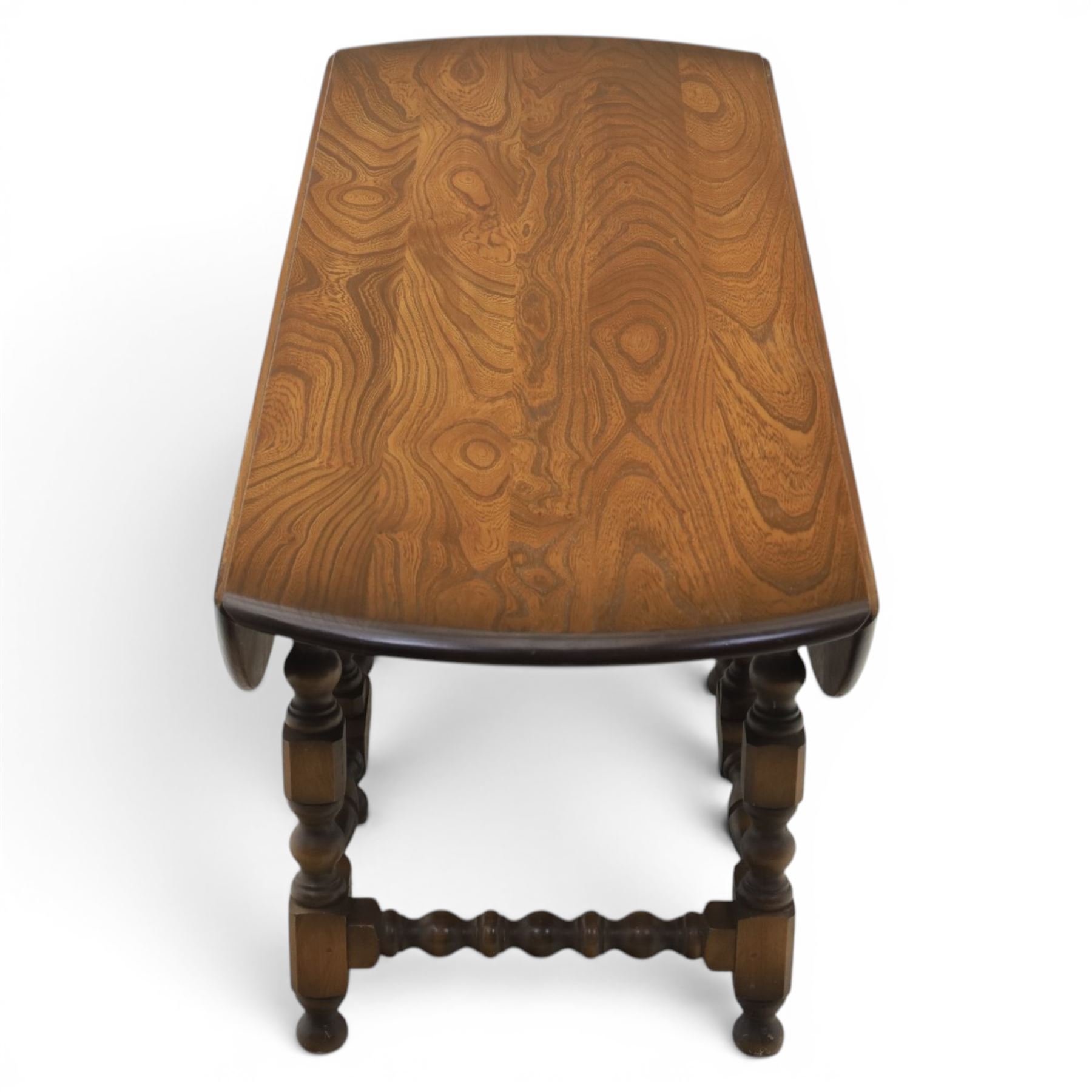 Ercol - elm oval/rectangular drop leaf coffee table, bobbin turned base