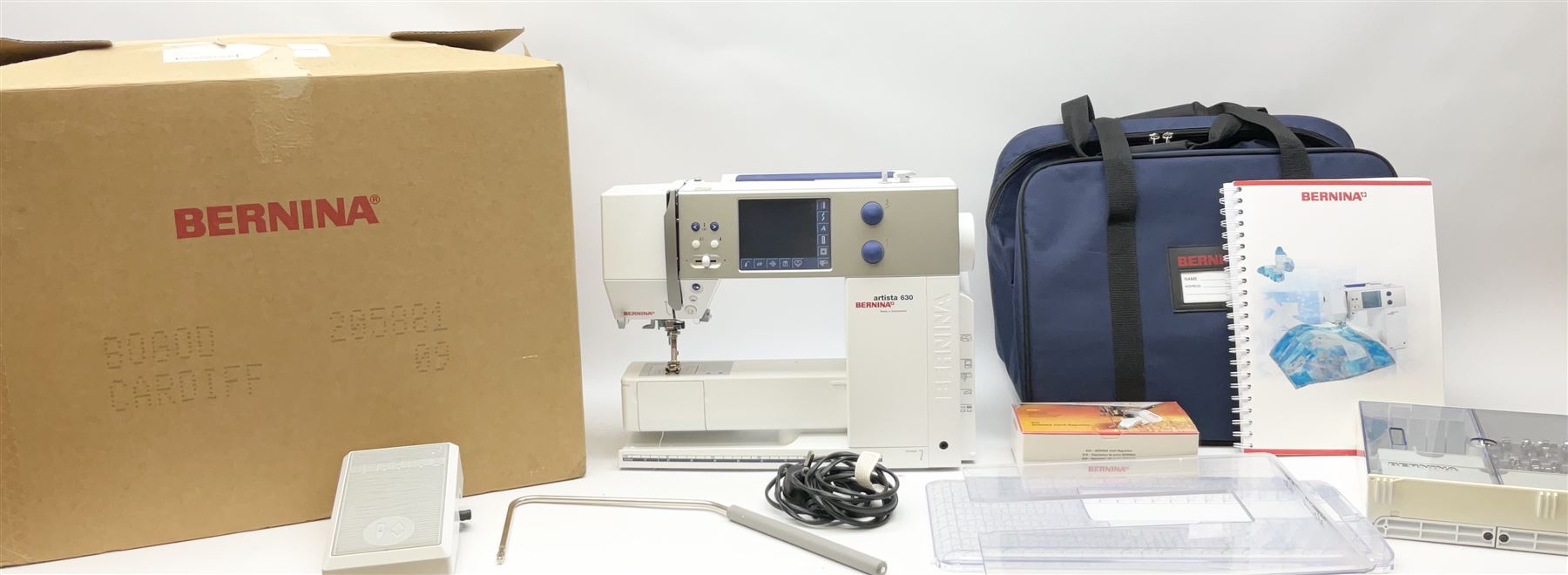 Bernina 'Artista' 630 computerised sewing machine with stitch regulator, carrying case, instruction booklet and accessories, in original box