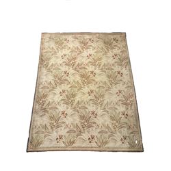 Early 20th century beige ground carpet decorated with flowers and foliage, repeating boarder, field of flowers and foliage 