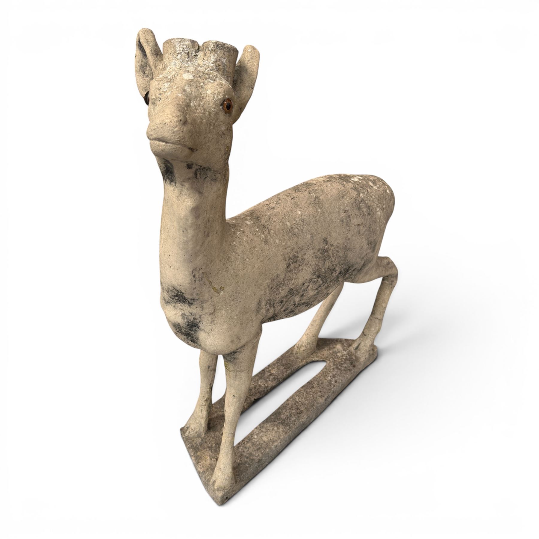 Pair of cast stone garden deer in a weathered finish with two loose antlers