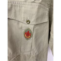 Mid 20th century Boy Scouts uniform, comprising corduroy shorts, further pair of shorts, two shirts, socks, and felt hat, together a framed collection of Ogden's 'Boy Scots' cigarette cards, and an unframed print of Lord Baden Powell. 