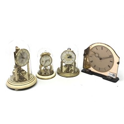  Mid 20th century anniversary clock under glass dome, two other similar anniversary clocks and a 30-hour mantle clock (4)  