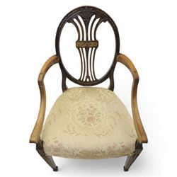 Edwardian painted open armchair, oval back with downswept arms, on carved tapered supports terminating in spade feet