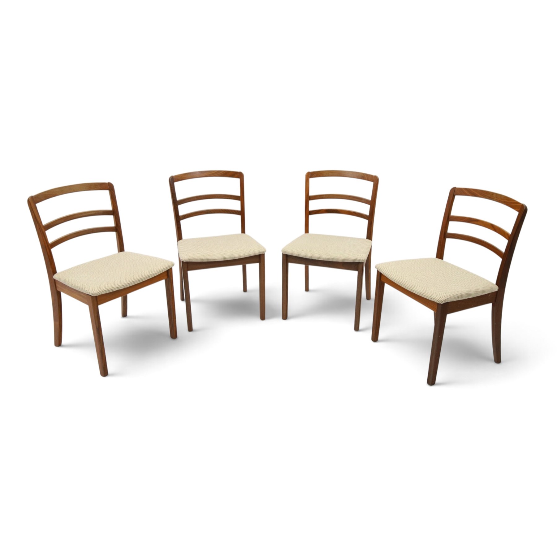 G-Plan - set of four mid-20th century teak 'Fresco' dining chairs, low ladder back on seats upholstered in chequered fabric, on square tapering supports