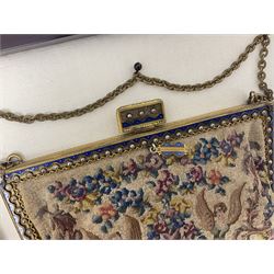 Continental petit point evening bag, with enamel and pearl details, in wooden display frame, together with a snake skin handbag and three other vintage bags