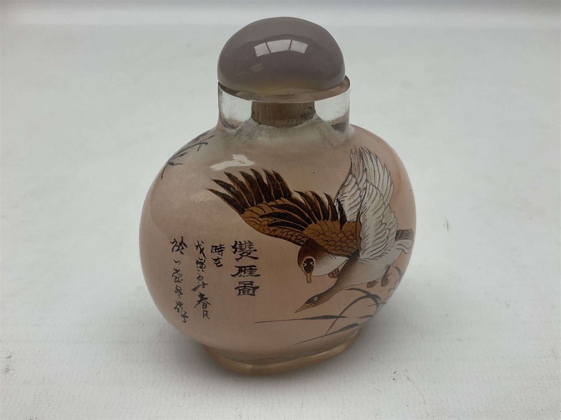 Seven Chinese glass snuff bottles painted with figures and animals, together with three wood mounted bone examples