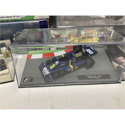 Panini Formula 1 The Car Collection - twelve die-cast models including ten in unopened packaging with periodical; all models in plastic display boxes; and eight other boxed die-cast models of racing cars by Corgi, Onyx, Classico, Minichamps etc (20)