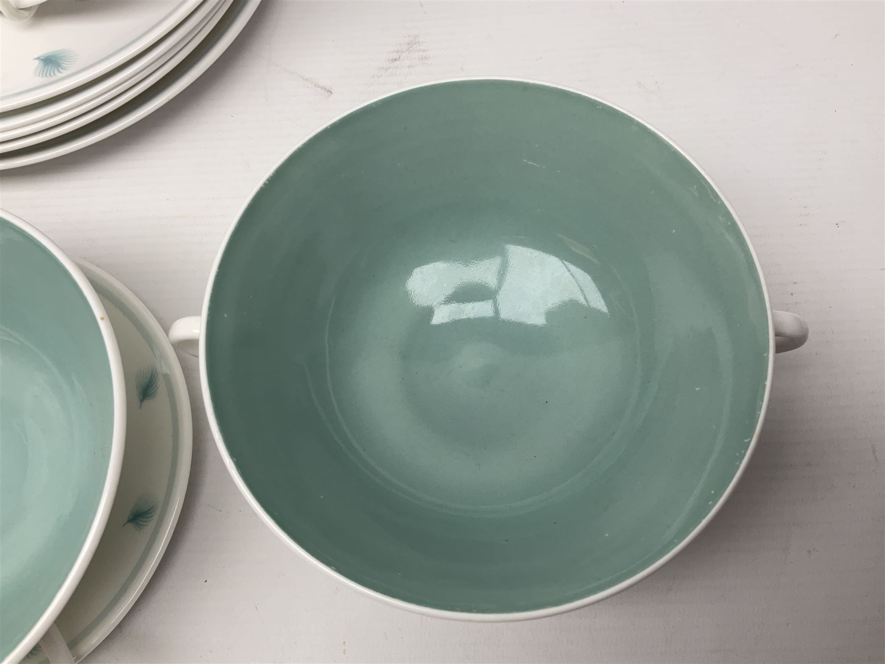 Susie Cooper Whispering Grass pattern dinner wares, to include tureen with cover, six twin handled soup bowls, dinner plates and side plates, etc 
