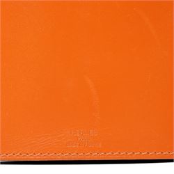 Hermès - ‘Press’ pocket torch, with orange leather sleeve