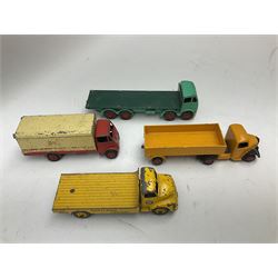 Dinky - eight unboxed and playworn/repainted commercial vehicles including Foden flatbed lorry, Bedford Articulated lorry, Leyland Comet Ferrocrete lorry, Guy Spratts panel van, Fire Engine, Jones Fleetmaster, Commer breakdown truck etc (8)