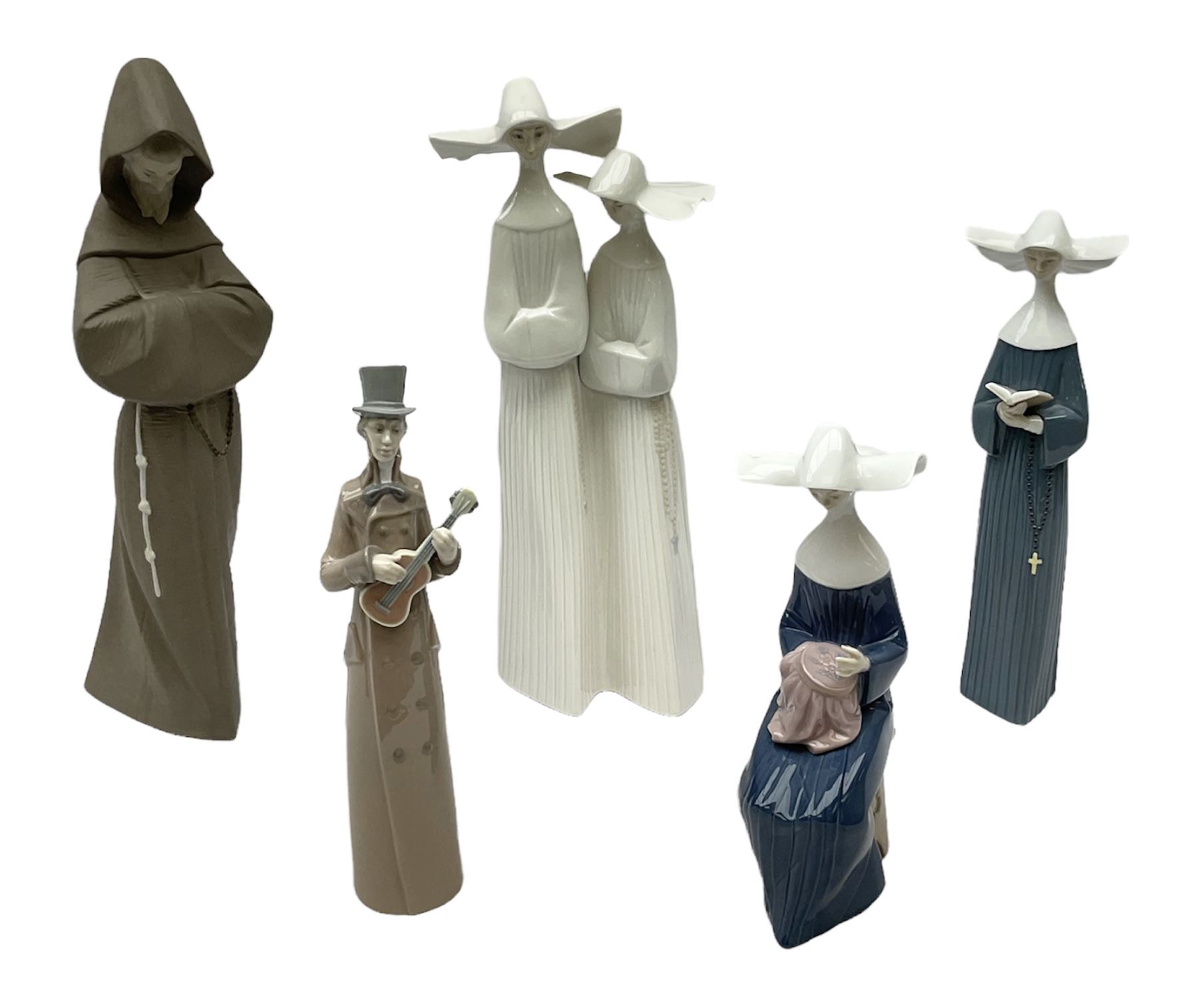 Three Lladro figures of nuns comprising Prayerful Moment no. 5500, Time to Sew no. 5501 and Two Nuns model no. 4611, together with figure of a monk no. 2060, and further Lladro bell figure