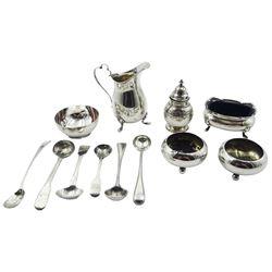 Group of assorted silver, to include early 20th century cream jug, of bellied form with with scroll top handle, upon three pad feet, hallmarked J & R Griffin, Chester 1918, pair of Victorian open salts of cauldron form, upon three ball feet, hallmarked Atkin Brothers, Sheffield 1860, a modern silver handled Bead Edge pattern cake knife, hallmarked United Cutlers Ltd, Sheffield 1993, a 20th century silver pepper, modern silver open salt, George III Fiddle pattern salt spoon, William IV Fiddle pattern salt spoon, pair of Victorian Bead Edge pattern salt spoons, etc., approximate total weighable silver, 9.13 ozt (284 grams)