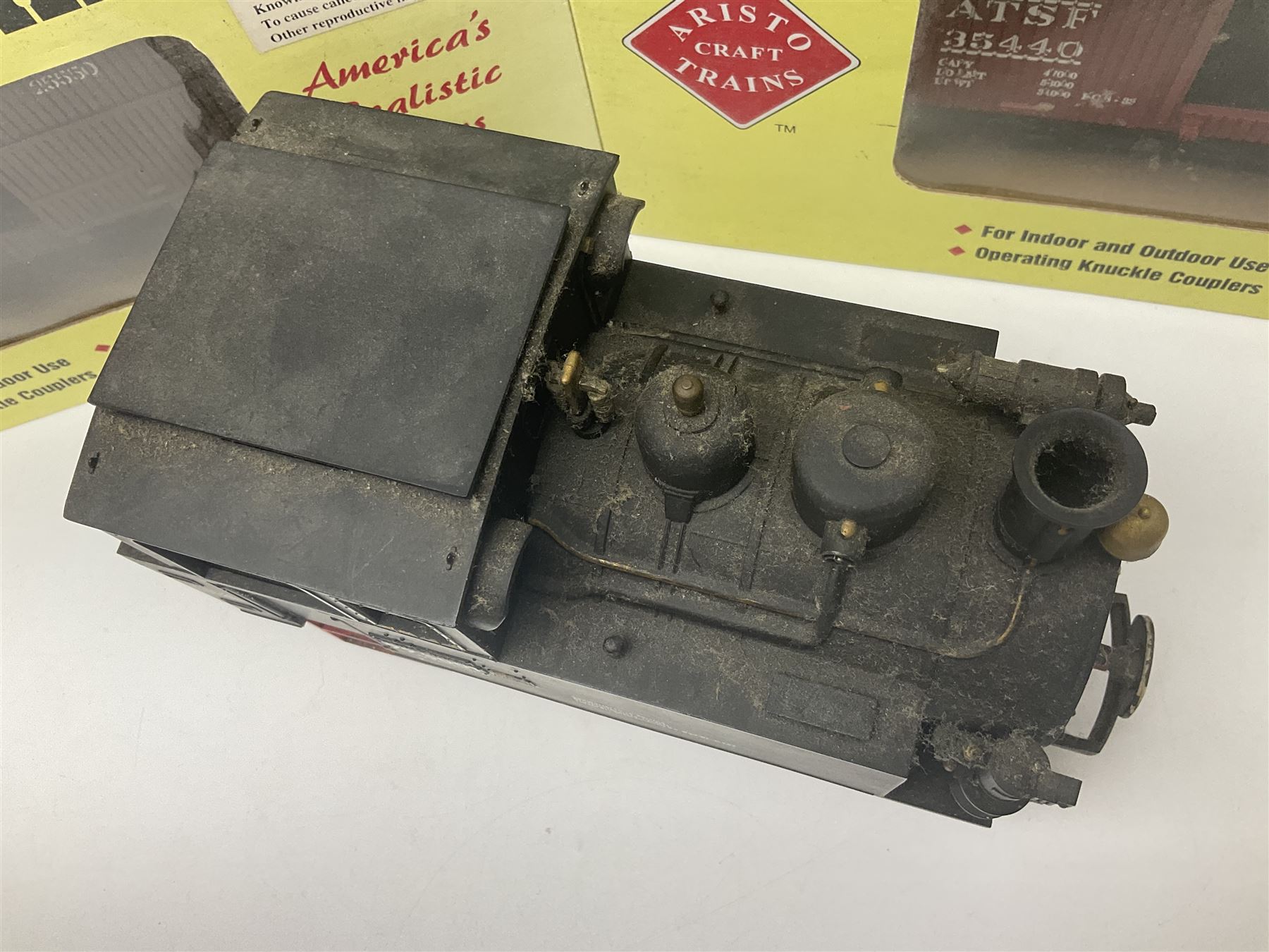 LGB (Lehmann Gross Bahn) G scale, gauge 1 - 0-4-0 tank locomotive No.995001; unboxed; and two American Aristo Craft Trains 2-axle boxcars Santa Fe and Pennsylvania; both boxed (3)