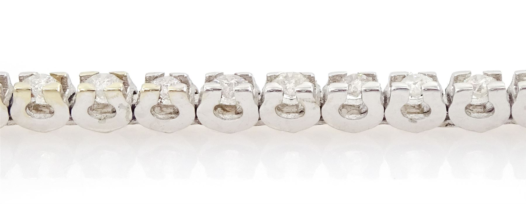 18ct white gold round brilliant cut diamond line bracelet, stamped 750, total diamond weight approx 1.40 carat