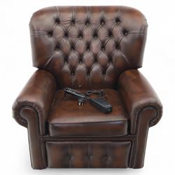 Thomas Lloyd  - electric reclining armchair, brown leather,  button upholstered back, cushion seat, and wide scrolled arms, raised on bun feet 