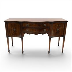 Georgian design mahogany serpentine sideboard, shaped top over two central drawers flanked...