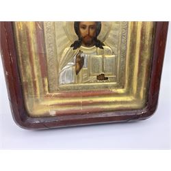 Early 20th century oil on panel religious icon of Jesus, with gilt detail, surrounded by a gilt frame within a hinged glass wall hanging, H25cm, L18cm  