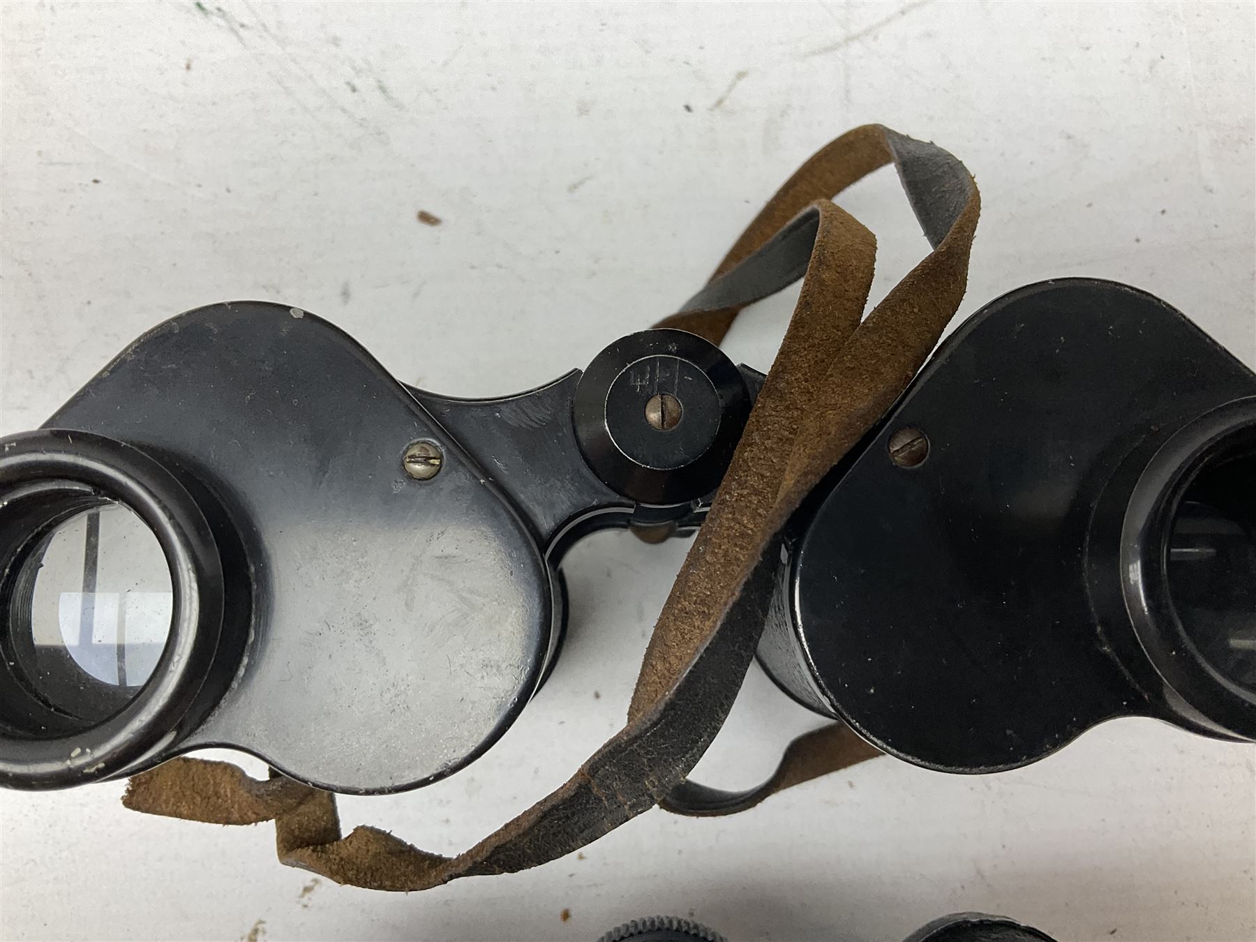 Twelve pairs of binoculars to include BWCF 7x35 Extra Wide Angle, Carl Zeiss Jena Delturis 8x24, Carl Zeiss Jena Jenoptem 8x30W, Chinon Countryman 10x50,  Ajax 8x30, Regent 16x50, etc,  some with cases