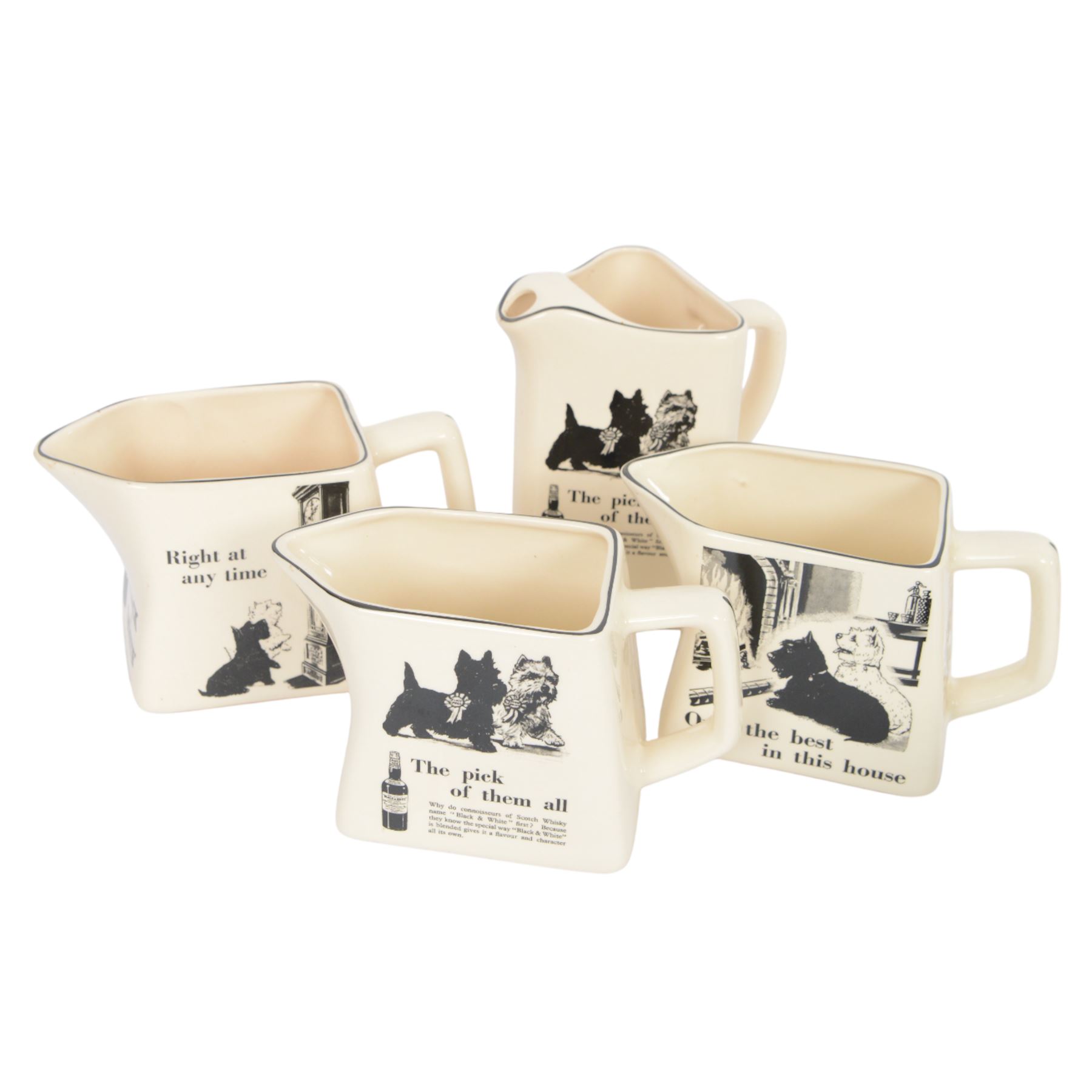 Eight Black and White Scotch Whisky advertising jugs