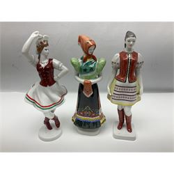 Group of six Hollohaza of Hungary figures, to include Baroque style gentleman playing mandolin and female with music sheet, examples in traditional dress, etc, together with further Hollohaza ceramics comprising bowl and plates painted with flowers and candlestick, tallest H30cm (10)