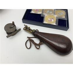Six early 20th century fishing reels, to include wooden and brass examples, together with a leather powder flask, 1913 Christmas tin, Morgan dollar, Queen Victoria double florin and a collection of other coins, etc 