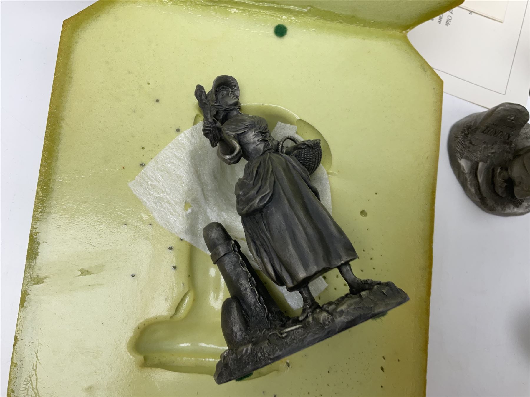 Twelve Franklin Mint pewter figures, to include some from the Cries of London series, together with a Franklin Mint 1937 Rolls Royce Phantom III pewter model and Danbury Mint Christmas bells