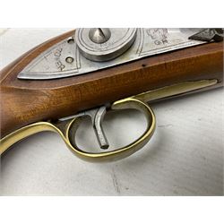 Reproduction non-firing flintlock pistol with brass skull crusher butt, the lock-plate inscribed 'Tower' and 'GR' L40cm; Sabre Japan Original Bowie Knife in sheath; and Indian embossed nickel two-piece walking cane (3)