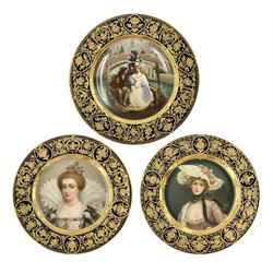 Three late 19th century Vienna cabinet plates, comprising two finely painted with quarter length portraits of female beauties to include Queen consort of France and Navarre, the third painted with a scene depicting a courting couple being rowed through Venice's waterways, all within burnished gilt and cobalt blue urn and floral scroll borders, all signed Wagner and with underglaze blue beehive and impressed marks and entitled Venedig, Marie de' Medici and Queen of Roses beneath, largest D26cm