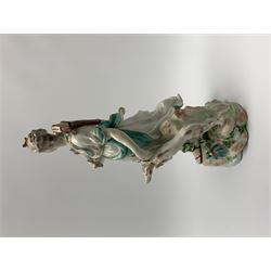 Mid 18th century Derby porcelain figure modelled as Dianna the Huntress, with quiver of arrows upon her back and dog by her side, upon a naturalistically modelled base, with patch marks beneath and collectors labels, H26cm