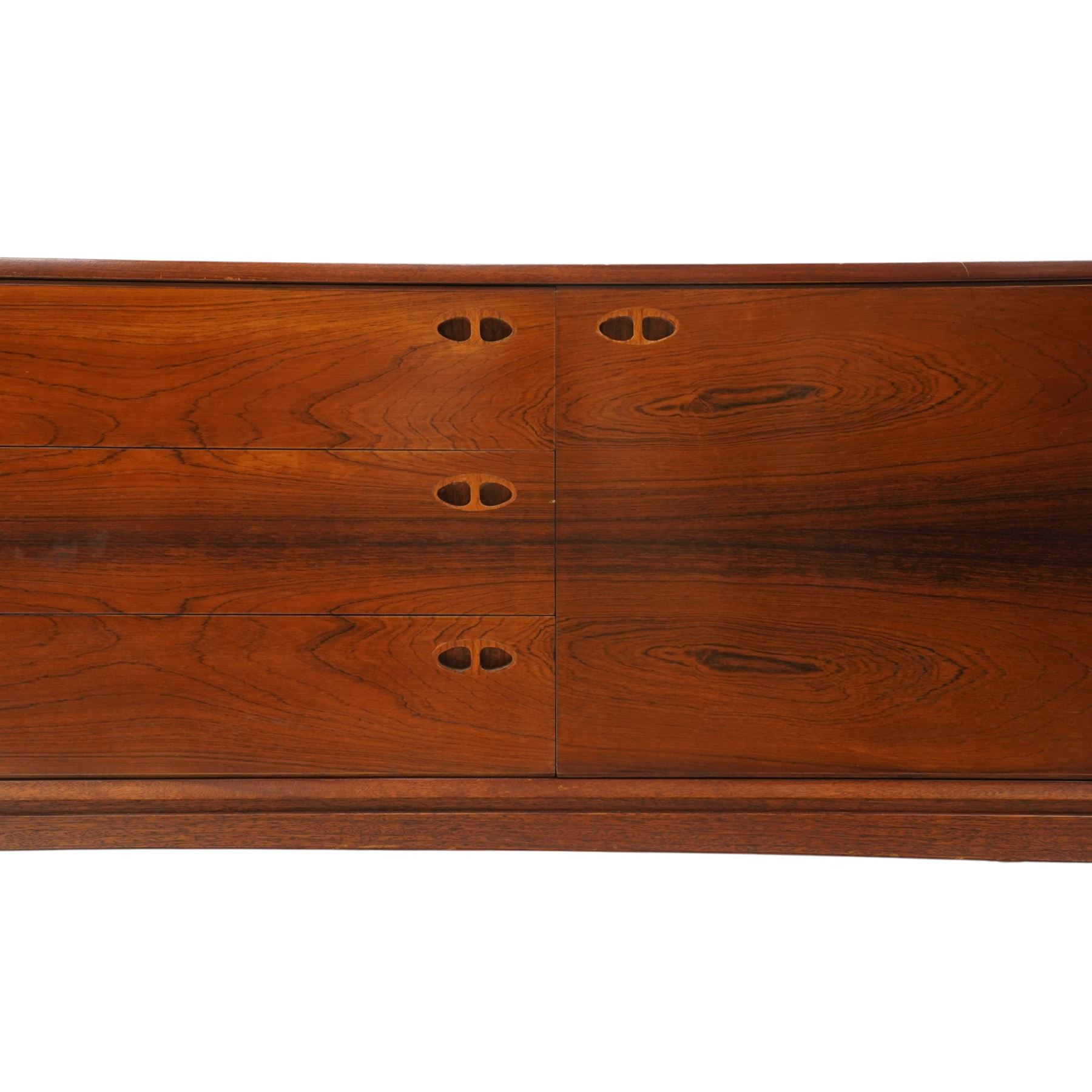 Robert Heritage (1927-2008) for Archie Shine - Large rosewood sideboard, with a central bank of three drawers flanked by a cupboard either side, raised on square tapering supports