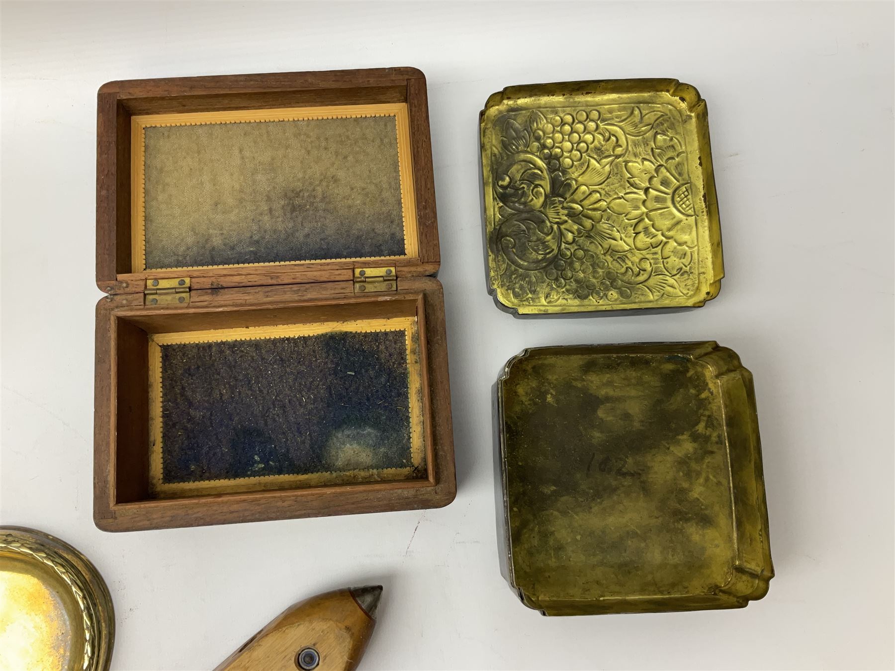 Olive wood lidded urn/vase, brass inkwell, Art Deco style perpetual desk calendar, leather bound Chesterman tape measure, brass roasting spit, Punch Magazines etc