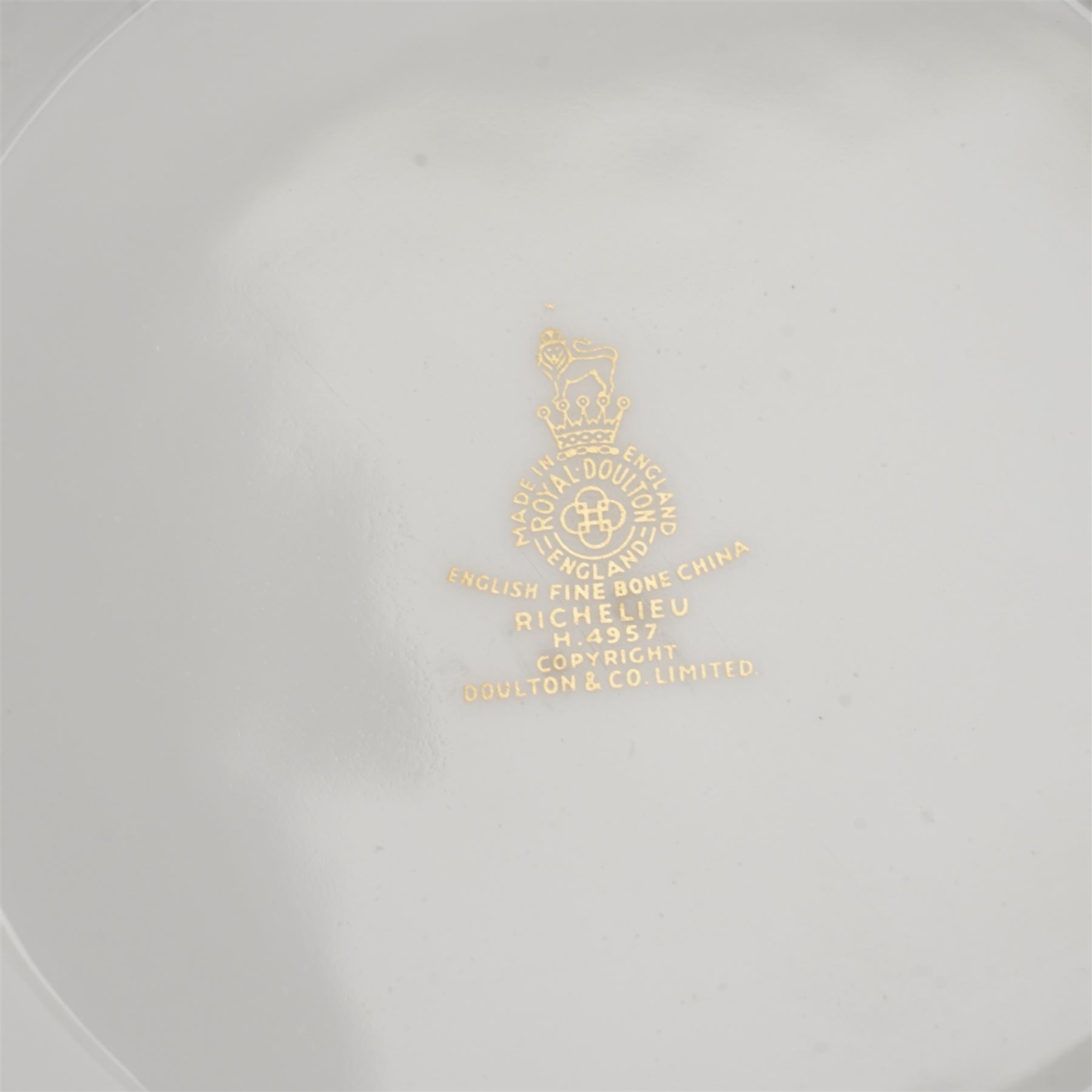 Royal Doulton dinner service in the 'Richelieu' pattern, comprising eleven dinner plates, twenty one dessert plates, twelve soup bowls, eleven dessert bowls, four vegetable dishes, oval serving dishes and graduating meat plates 