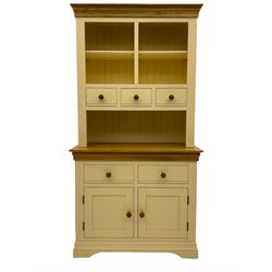 Cream and oak dresser, fitted with five drawers, two cupboards and open shelves 