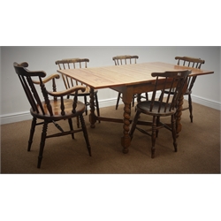  Early 20th century oak drawer leaf dining table, barley twist supports joined by stretchers 151cm x 90cm, H75cm and five stick back chairs (4+1)  